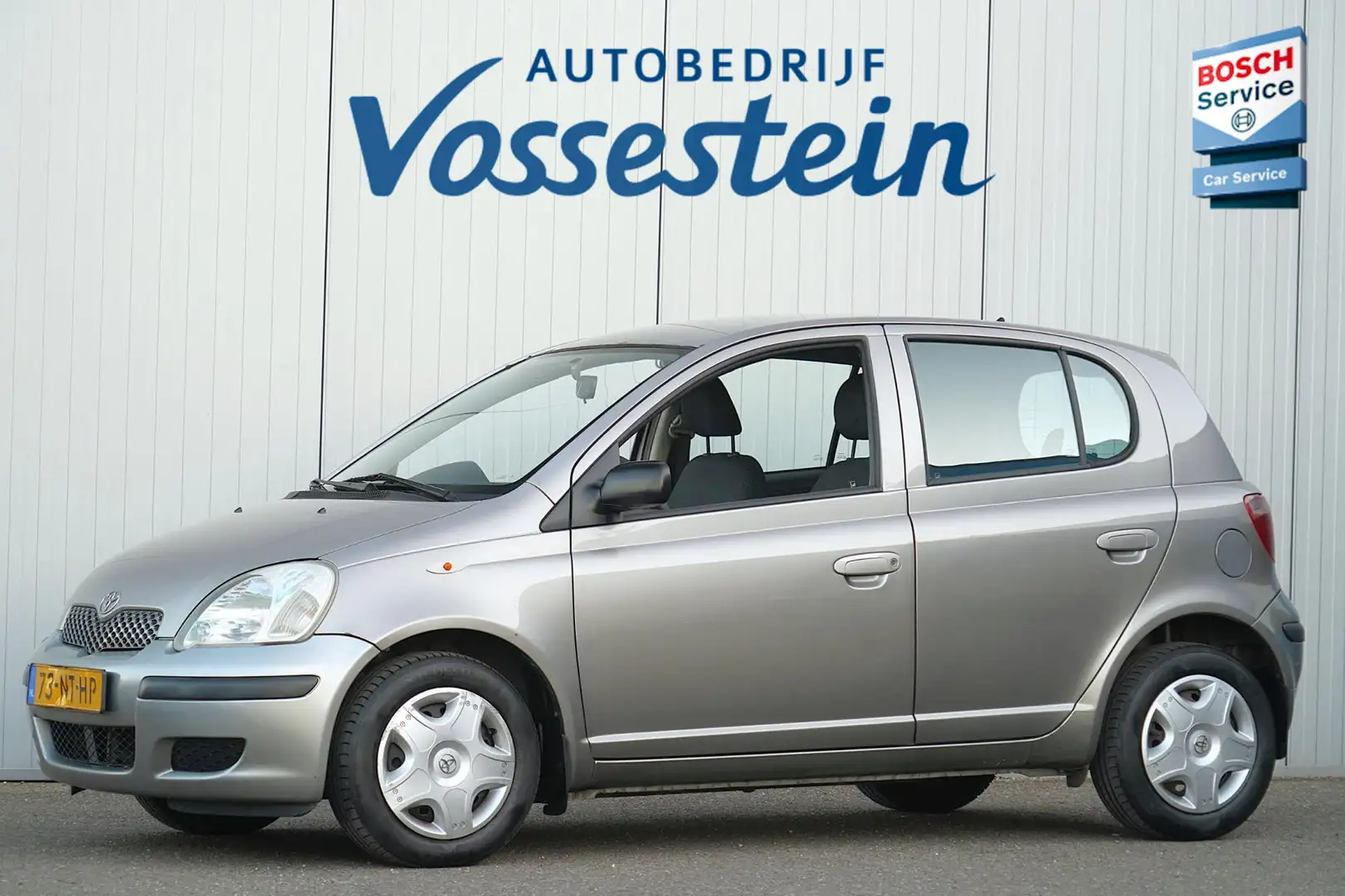 Toyota Yaris 1.3 VVT-i Idols / 5-Deurs / Elek. Ramen / NL-Auto Gri - 1