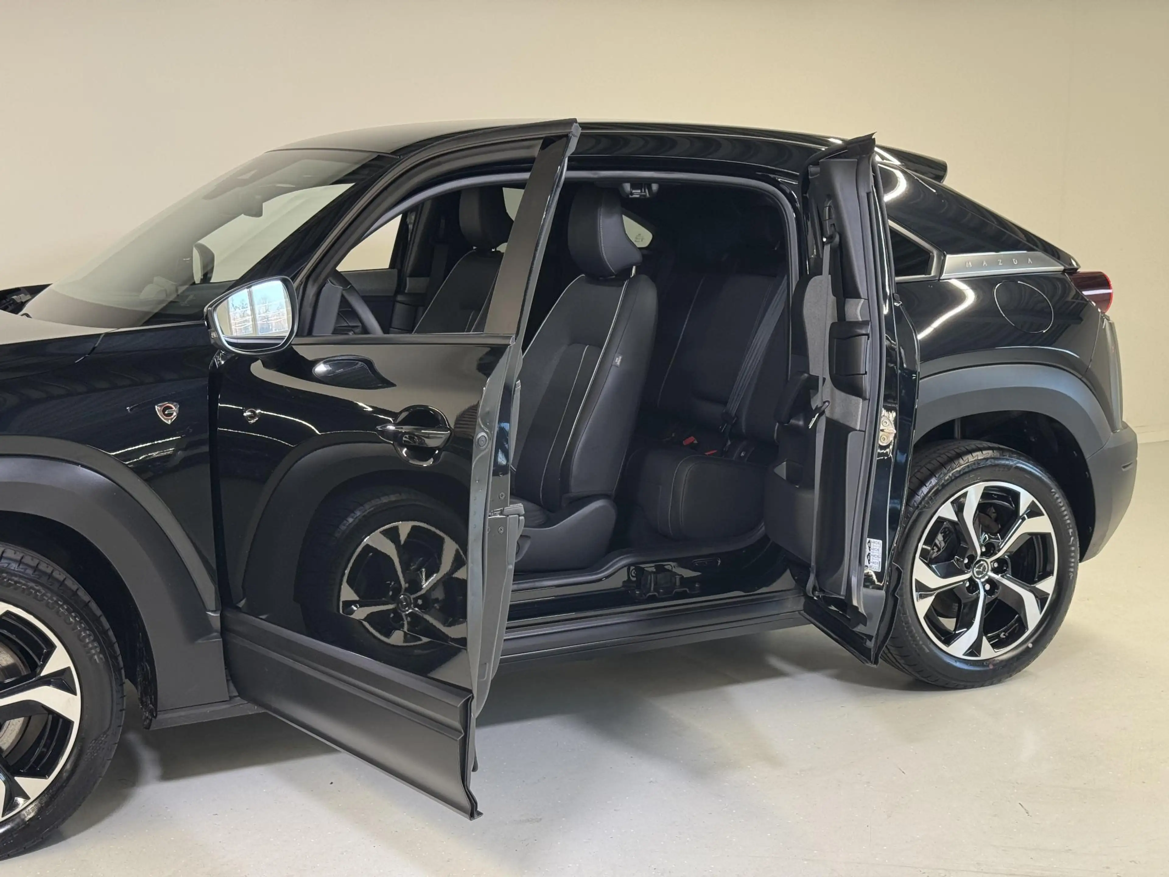 Mazda MX-30 e-SkyActiv R-EV 170 Exclusive-line Stoel-stuurverw — photo 9