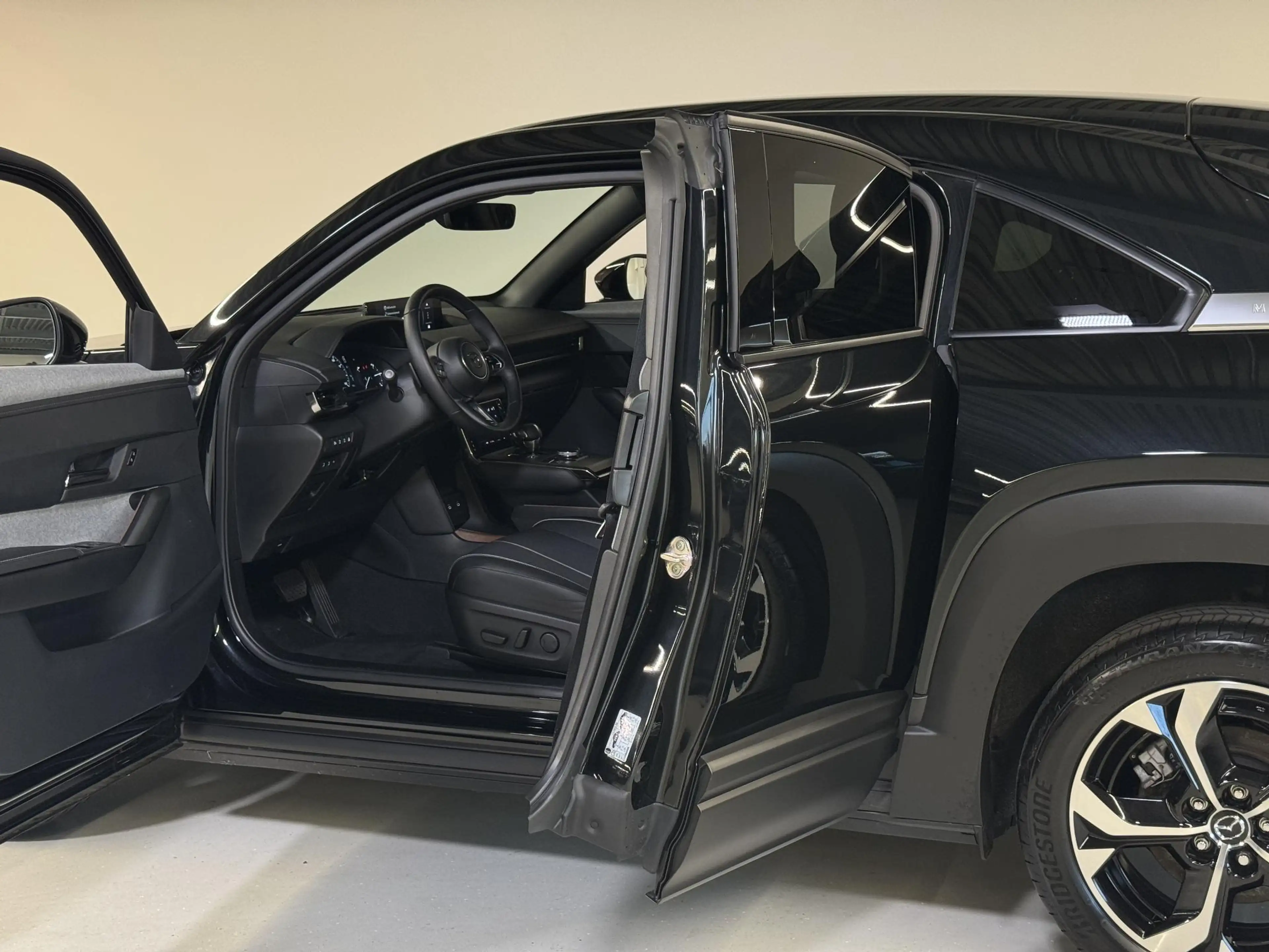 Mazda MX-30 e-SkyActiv R-EV 170 Exclusive-line Stoel-stuurverw — photo 10