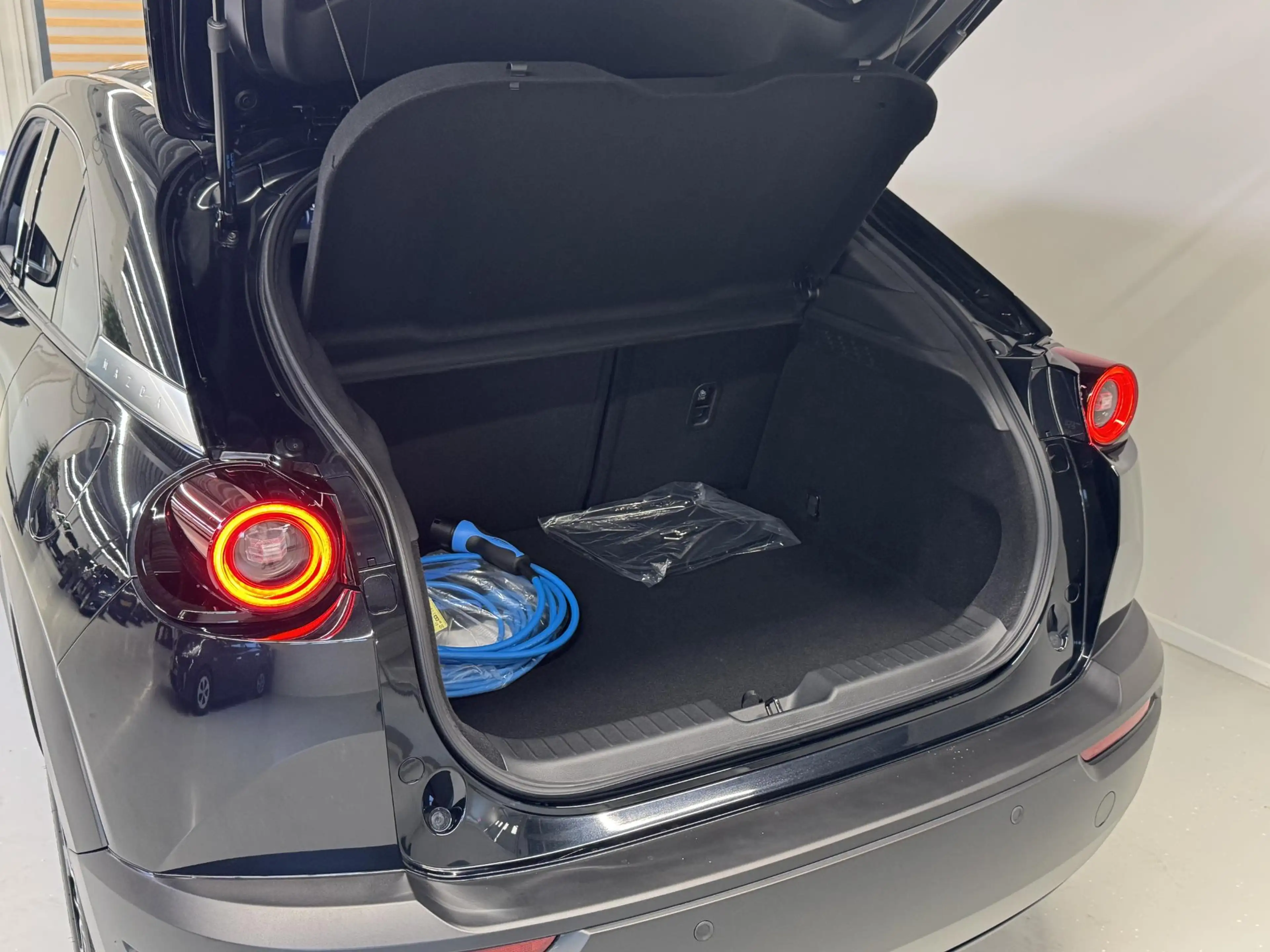 Mazda MX-30 e-SkyActiv R-EV 170 Exclusive-line Stoel-stuurverw — photo 13