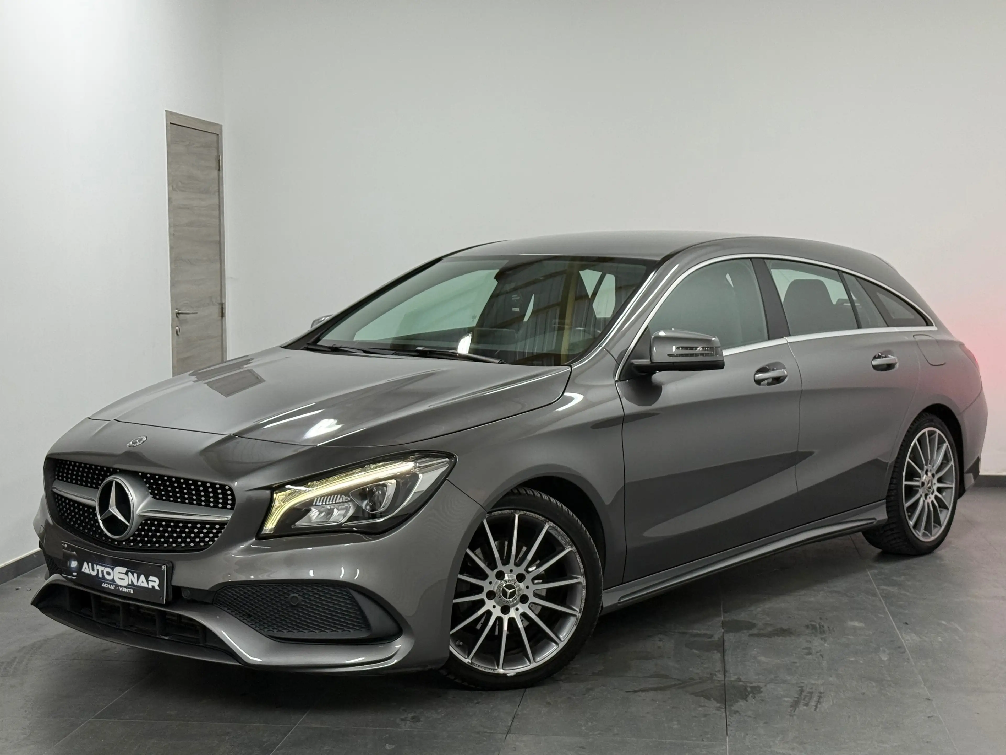 Mercedes-Benz CLA 180 1.6i Pack AMG - Airco - Navi - LED - Camera — photo 4