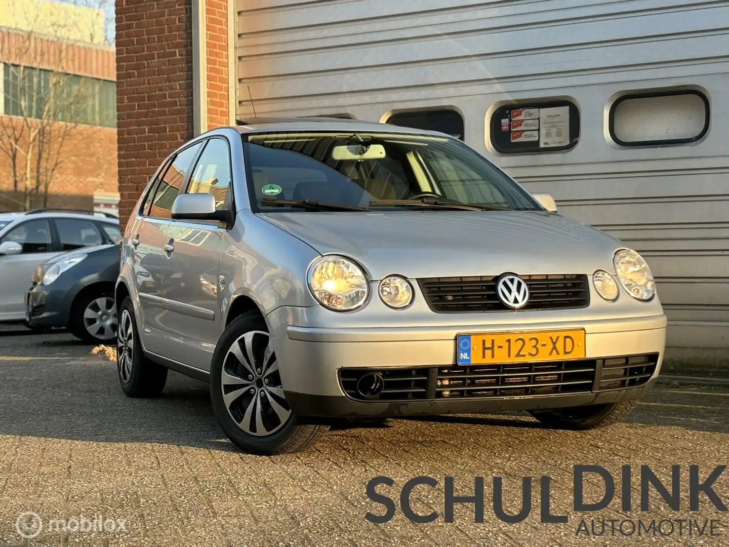 Volkswagen Polo 1.2-12V DAKRAAM|ELEK. RAMEN|CRUISE CONTROLE Grijs - 1