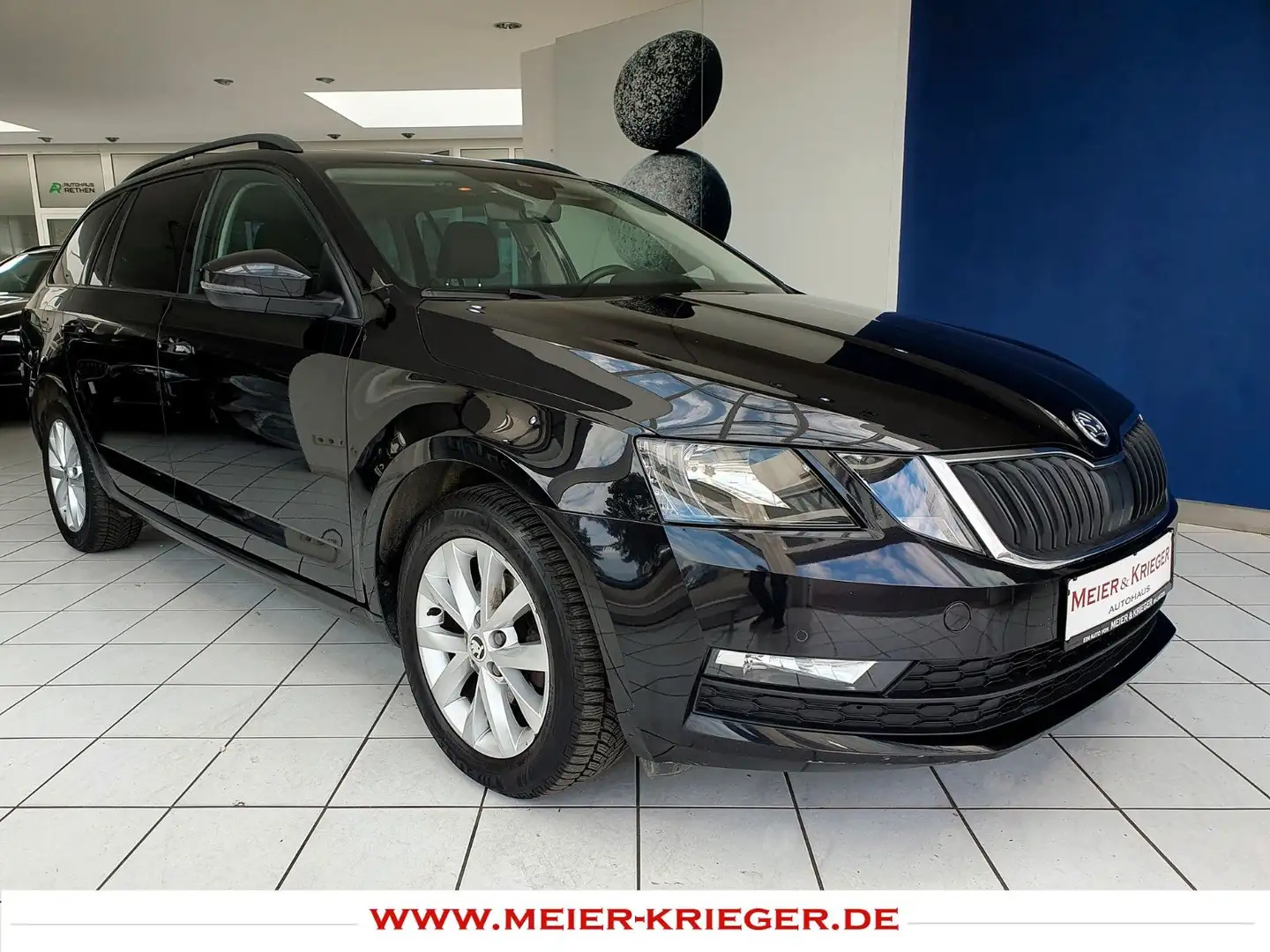 Skoda Octavia Combi Ambition Aut/Panorama/Kamera/AHK Zwart - 1