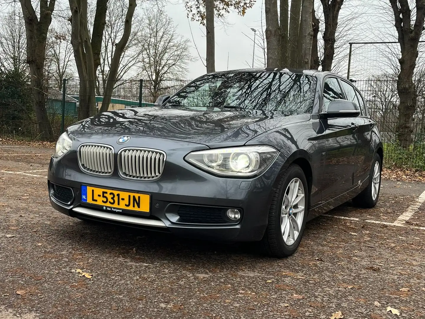 BMW 116 i Urban Executive - Xenon/Schuifdak/Nieuwe riem Grijs - 1
