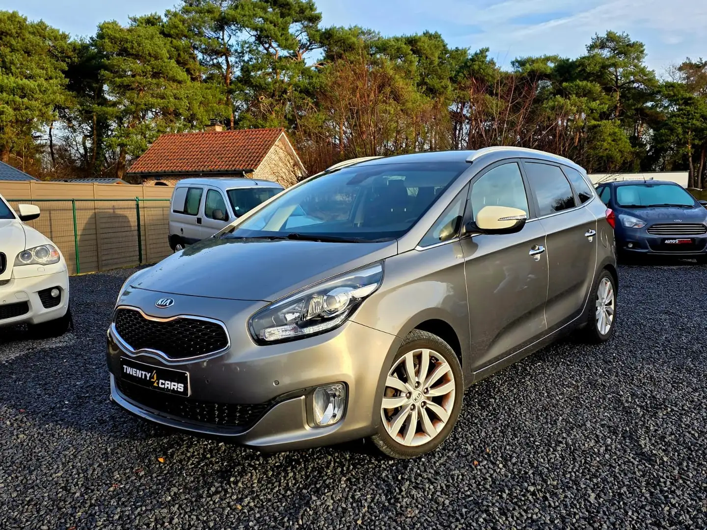 Kia Carens 1.7 CRDi 7 Zitplaatsen Airco CruiseC Led ParkeerS Brun - 1