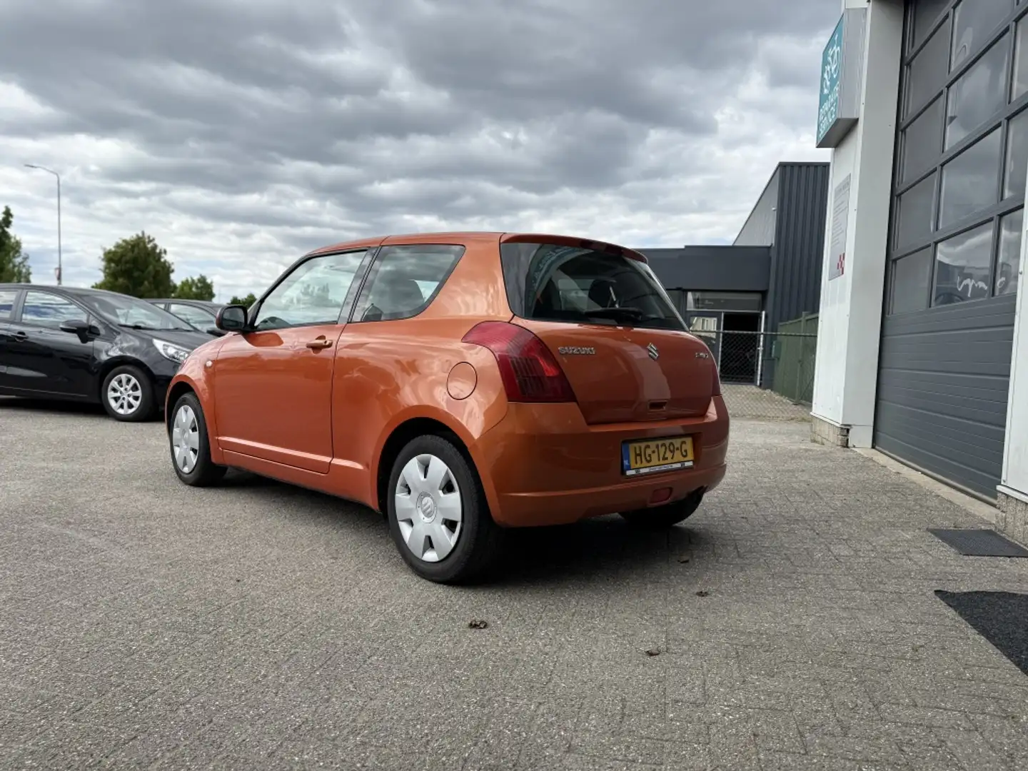 Suzuki Swift 1.3 GA Oranje - 2