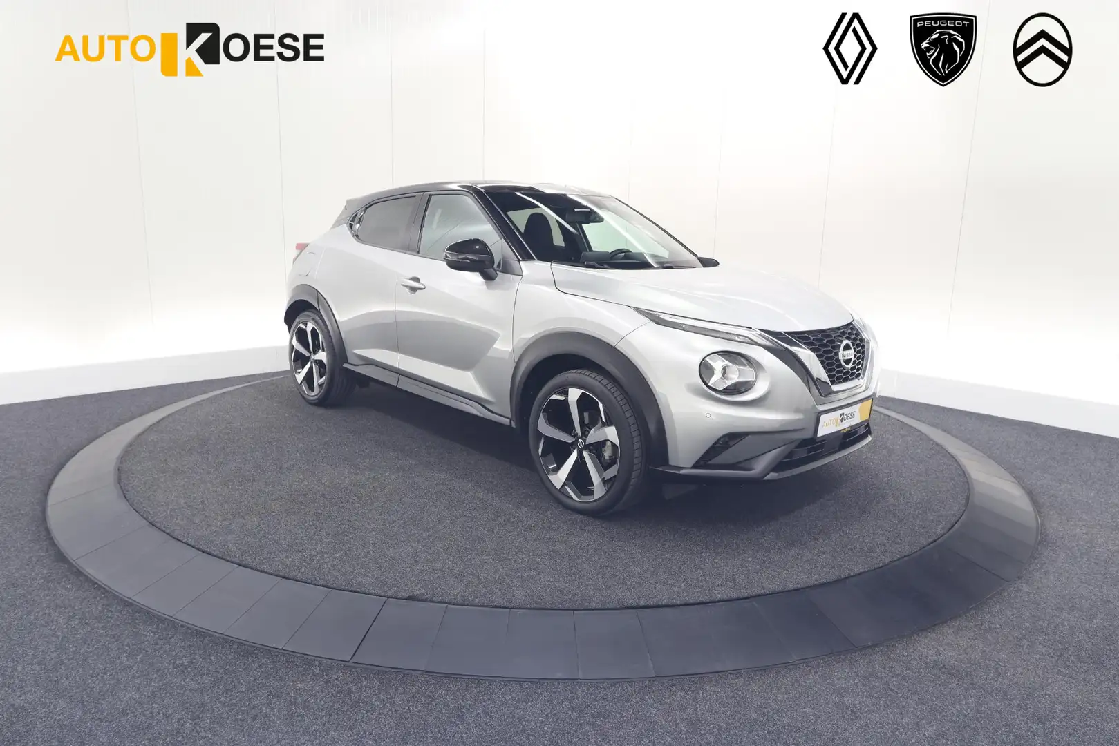 Nissan Juke 1.0 DIG-T Premiere Edition | Trekhaak | Camera | A Grijs - 1