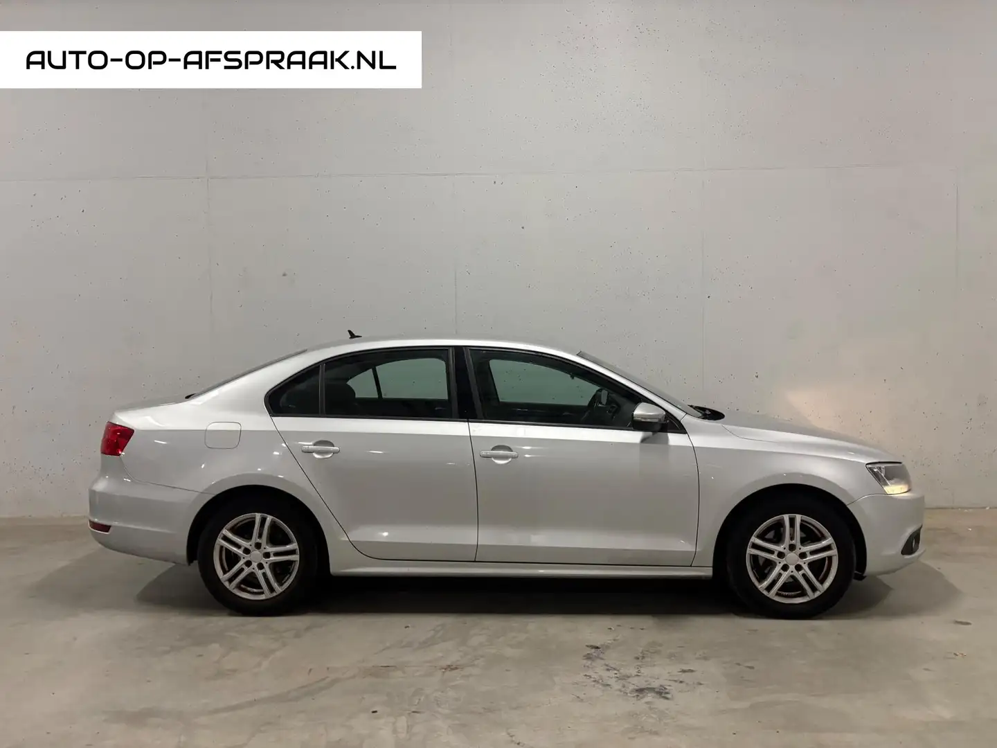 Volkswagen Jetta 1.2 TSI Comfortline Airco Cruise Control APK NAP Grijs - 1