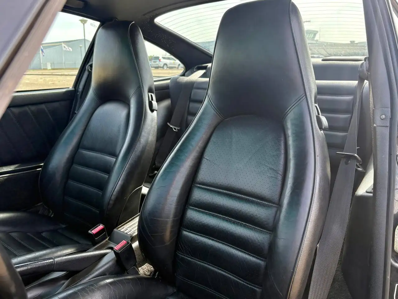 Porsche 964 Carrera 4 Coupé | Handgeschakeld | 2e Eig. | Zwart/Zwart | €15.000 Onderhoud recent, foto 9