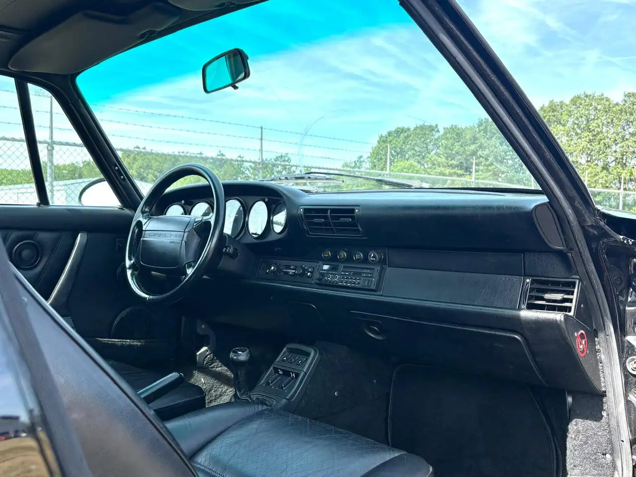 Porsche 964 Carrera 4 Coupé | Handgeschakeld | 2e Eig. | Zwart/Zwart | €15.000 Onderhoud recent, foto 8