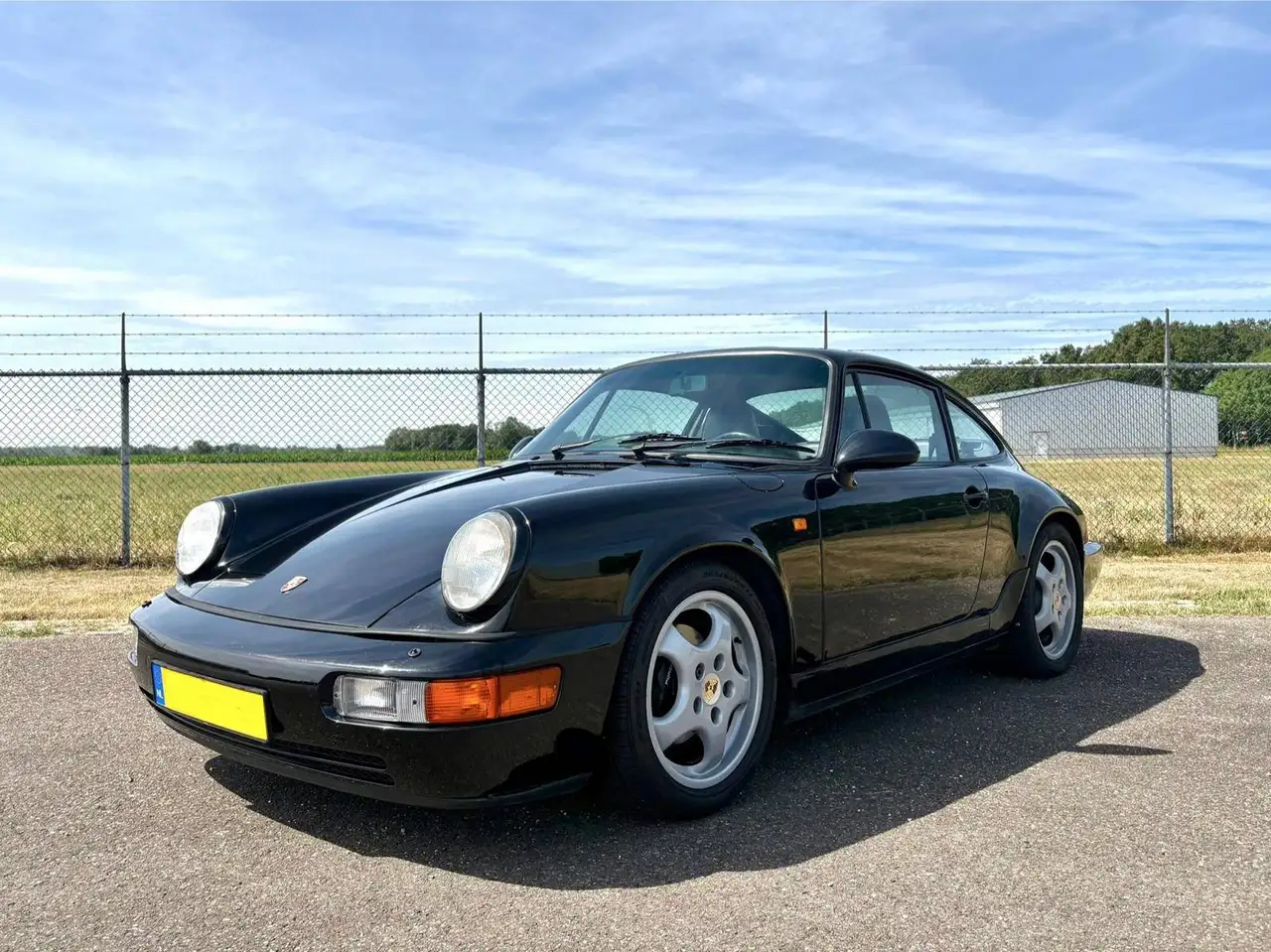 Porsche 964 Carrera 4 Coupé | Handgeschakeld | 2e Eig. | Zwart/Zwart | €15.000 Onderhoud recent, foto 6
