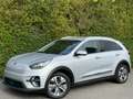 Kia e-Niro 64 kWh+NAVI+CAMERA+CARNET COMPLET+GARANTIE+CUIR Grijs - thumbnail 1