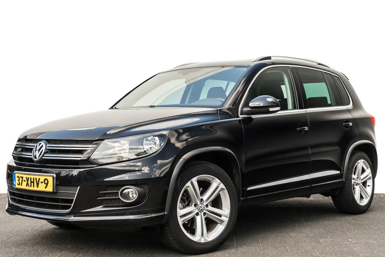 Volkswagen Tiguan 1.4 TSi R-Line | 18 inch LMV | Trekhaak | Spoiler Zwart - 1