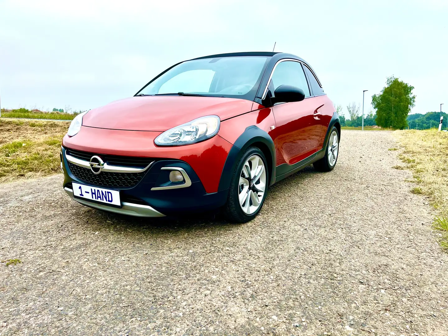 Opel Adam Rocks 1.4i*1-HAND*TÜV-NEU*Bluetooth*Lenkr.Heiz. Orange - 1