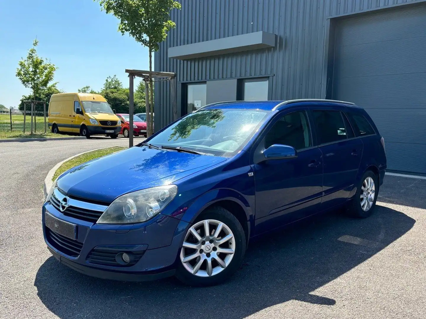 Opel Astra BREAK 1.7 CDTI 100CH ELEGANCE - 148934 KMS - CARNE Bleu - 1