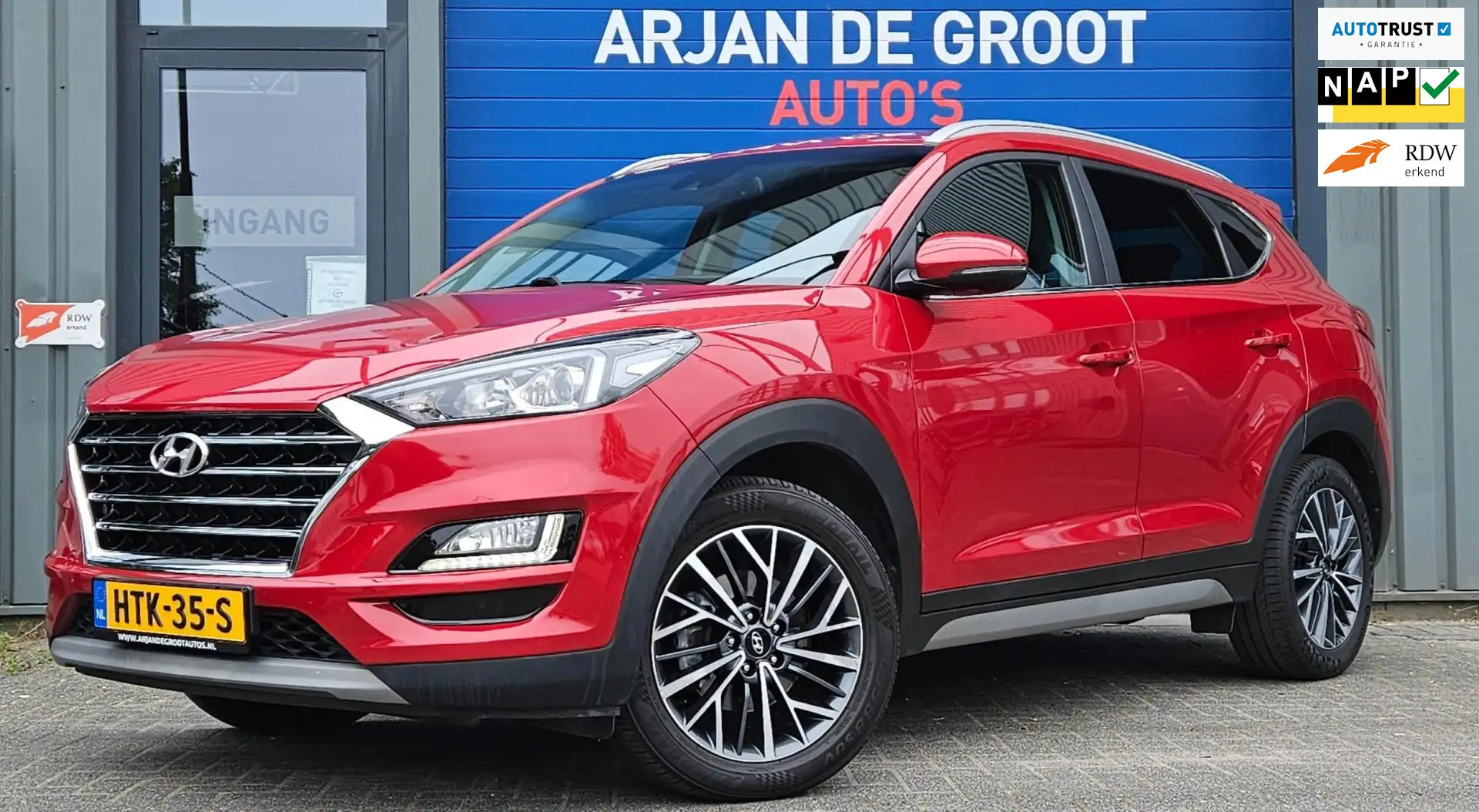 Hyundai TUCSON 1.6 T-GDI 177PK Navi Cruise Leder Carplay® Camera Rood - 1