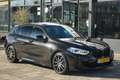 BMW 135 1-serie M135i xDrive High Executive | ACC | PANO | Zwart - thumbnail 1