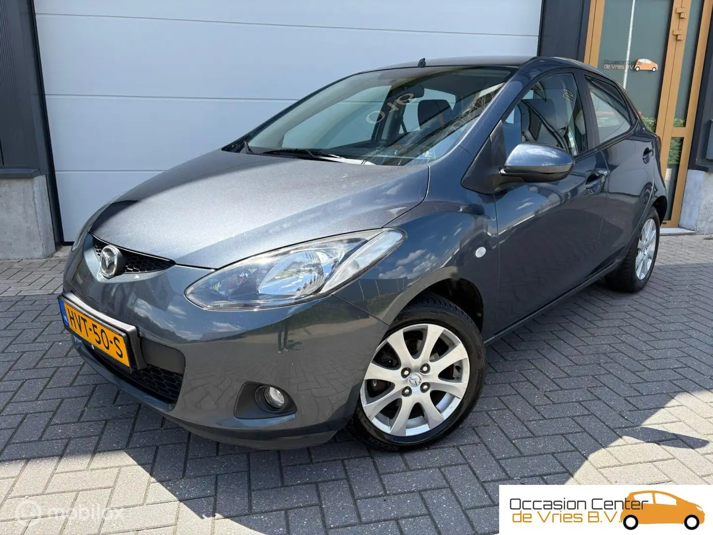 Mazda 2 1.3 Airco Navi Carplay Velgen Bluetooth Stoelverwa Grijs - 1