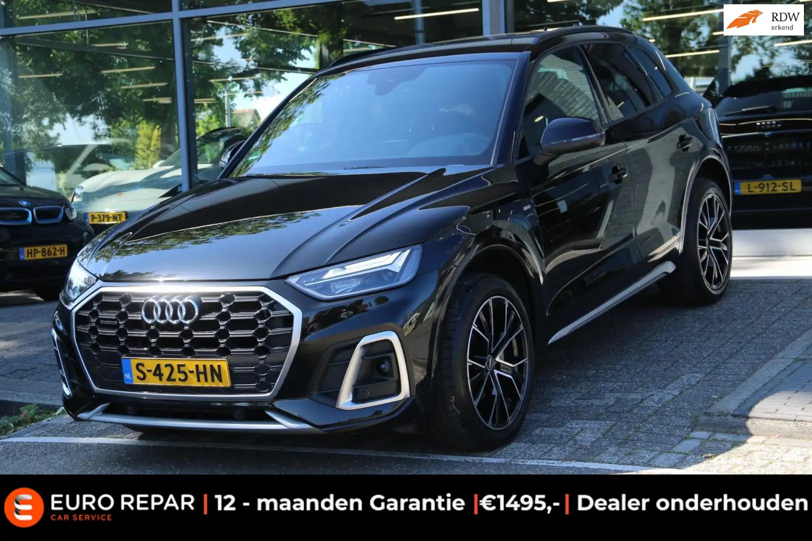 Audi Q5 55 TFSI e S-LINE DEALER OND. NIEUW MODEL! Zwart - 1