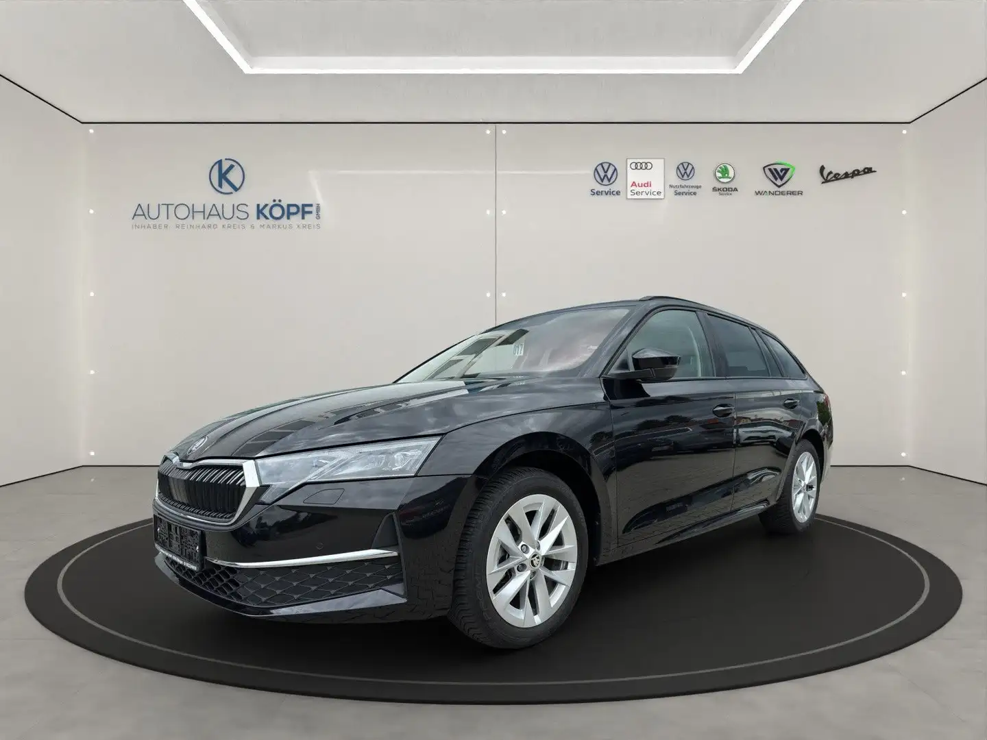 Skoda Octavia Combi 1.5 TSI mHEV Selection_Pan_AHK_Teilleder Schwarz - 1