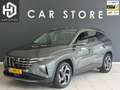 Hyundai TUCSON 1.6 T-GDI HEV Premium Memory|Trekhaak|Leder|360Cam Grigio - thumbnail 1
