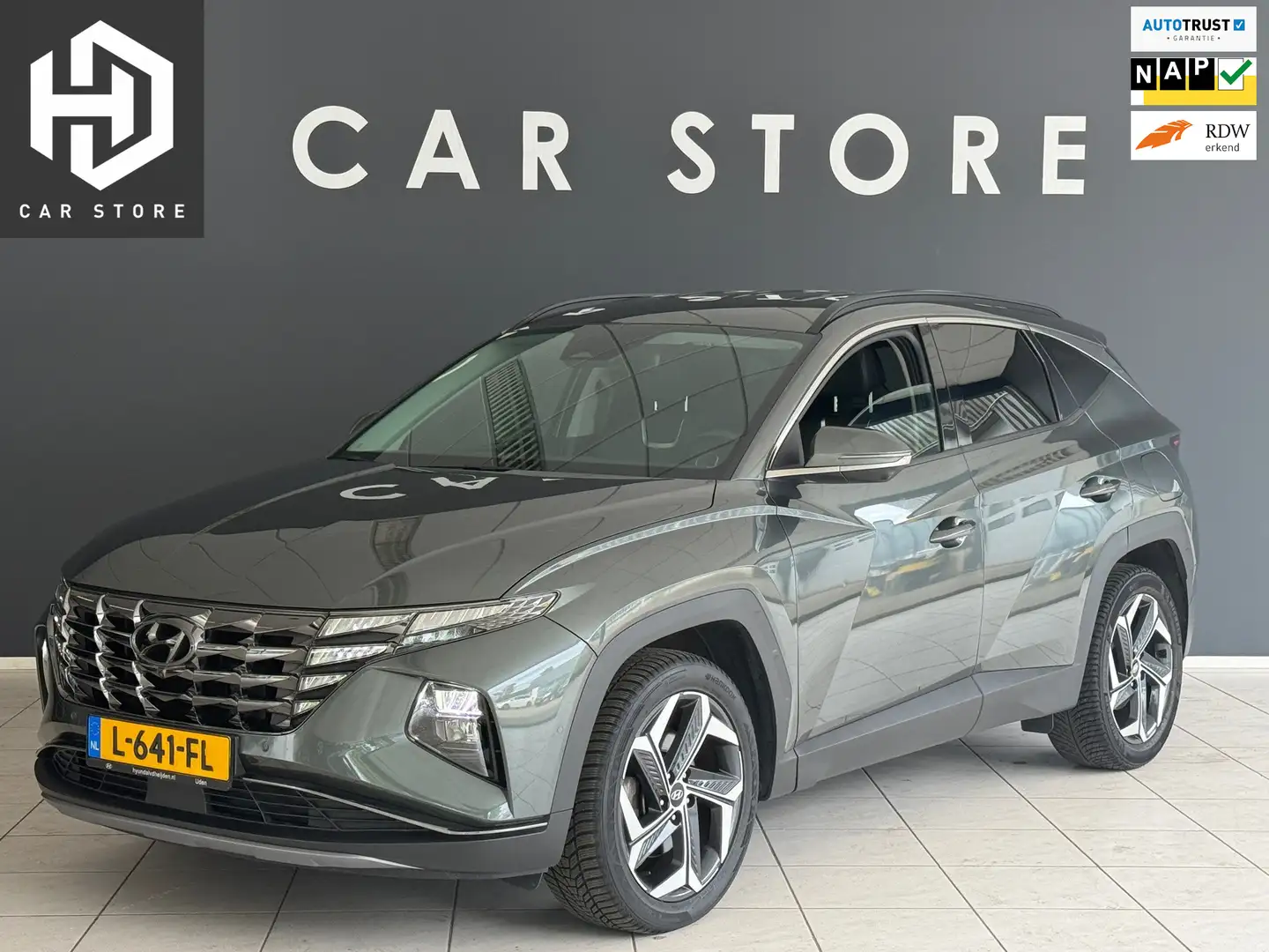 Hyundai TUCSON 1.6 T-GDI HEV Premium Memory|Trekhaak|Leder|360Cam Grigio - 1