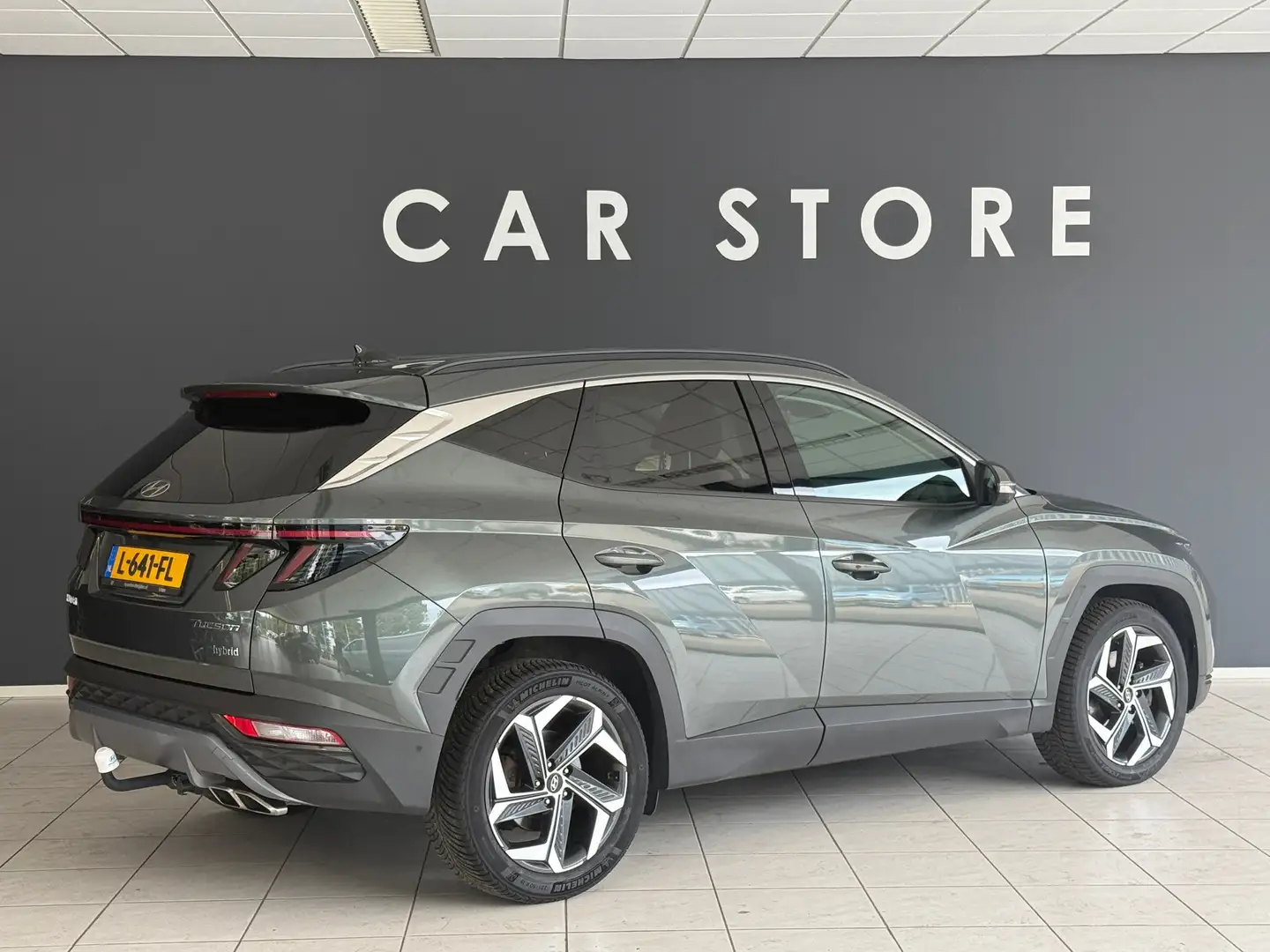 Hyundai TUCSON 1.6 T-GDI HEV Premium Memory|Trekhaak|Leder|360Cam Grigio - 2