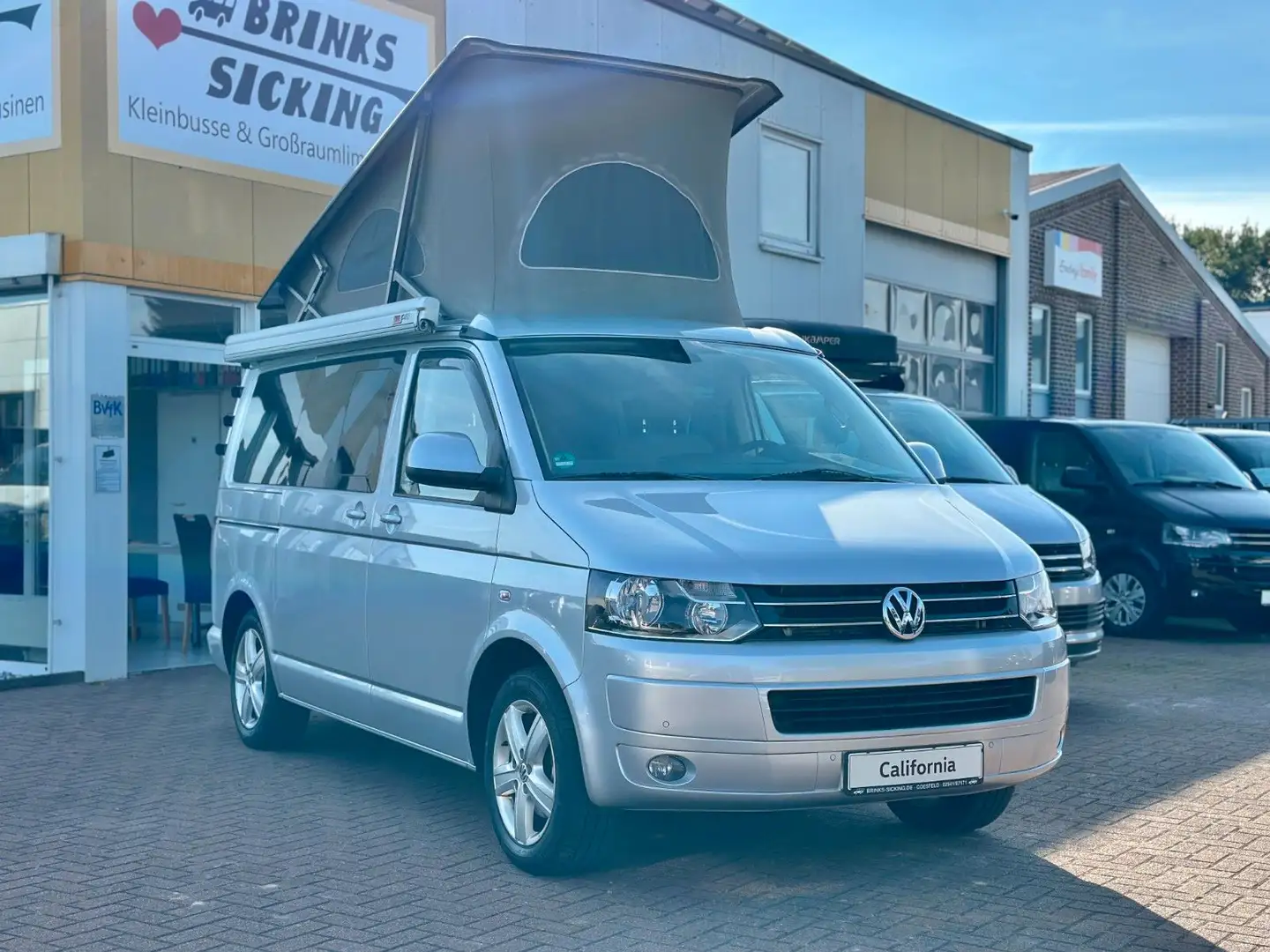 Volkswagen T5 California /140PS/AHK/MARKISE/5-SITZER/1.HAND Silber - 1