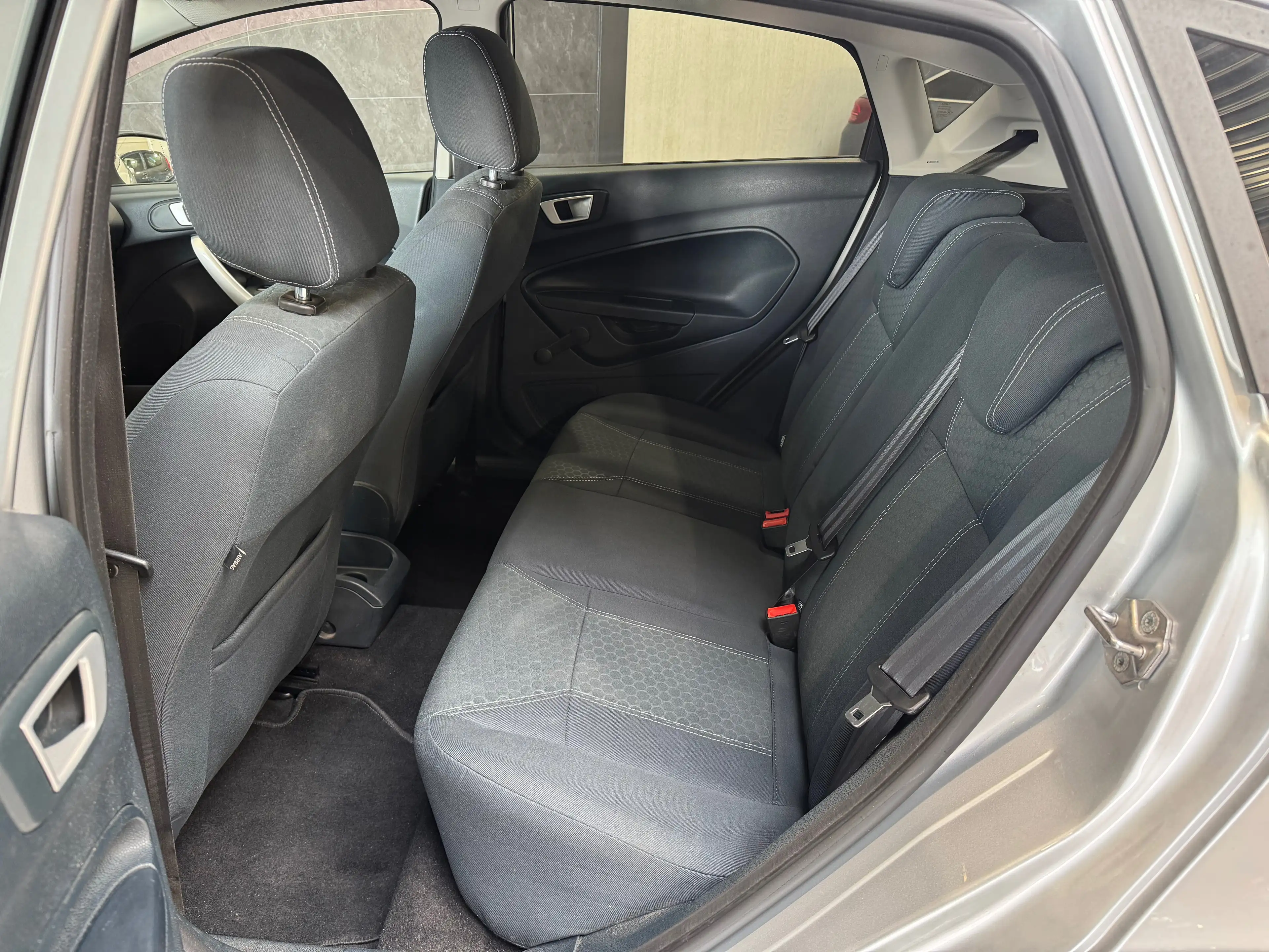 Ford Fiesta 1.25i* TITANIUM * 1ER MAIN * CARNET * JANTES * AIRCO — photo 11