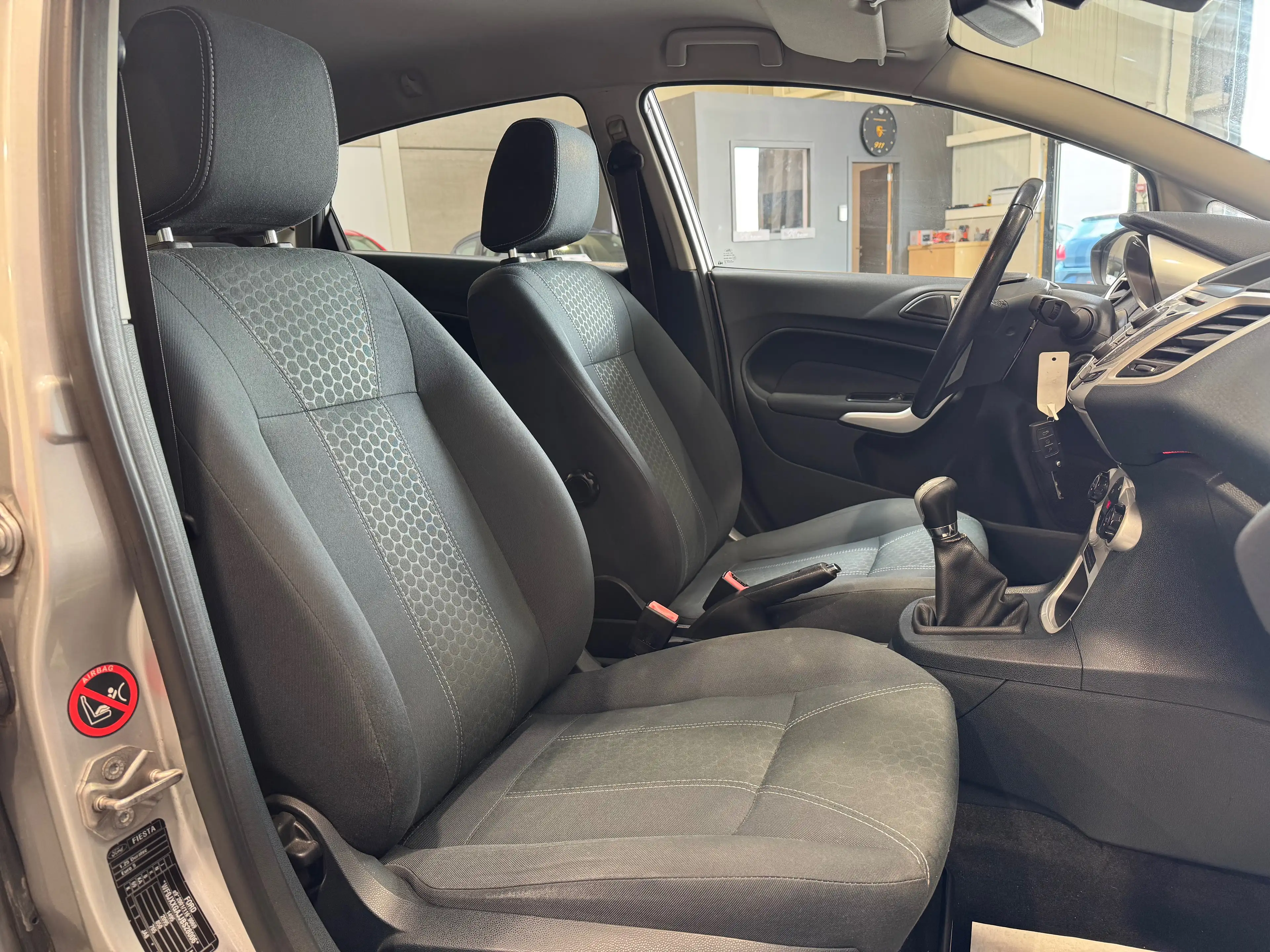 Ford Fiesta 1.25i* TITANIUM * 1ER MAIN * CARNET * JANTES * AIRCO — photo 13