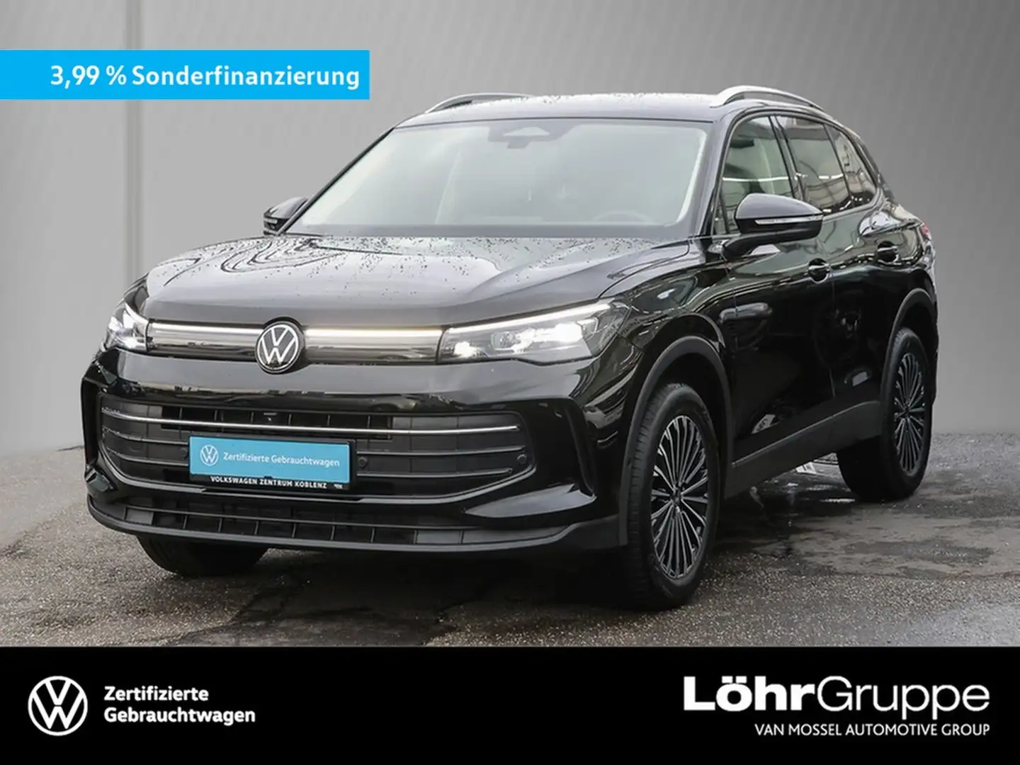 Volkswagen Tiguan 2.0 TDI DSG Life AHK/RFK/Navi Schwarz - 1