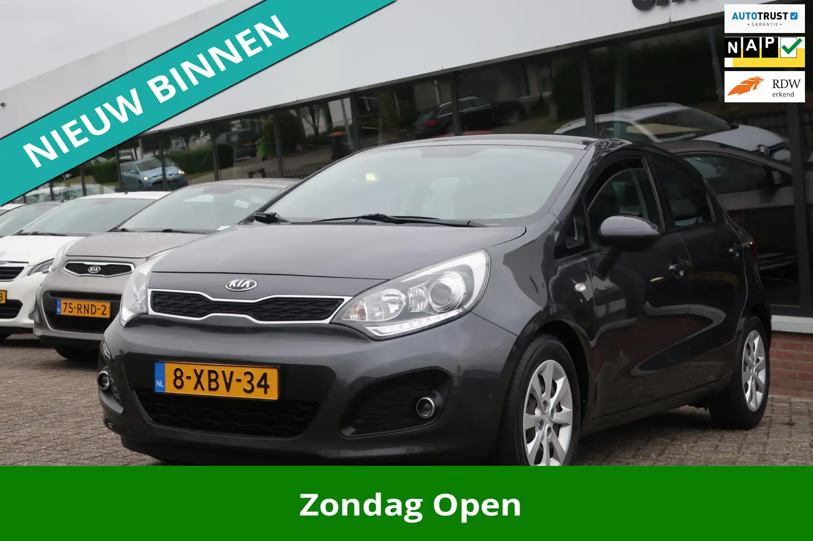 Kia Rio 1.2 CVVT BusinessLine 2e EIG_AIRCO_LED_CRUIS_N.A.P Gris - 1