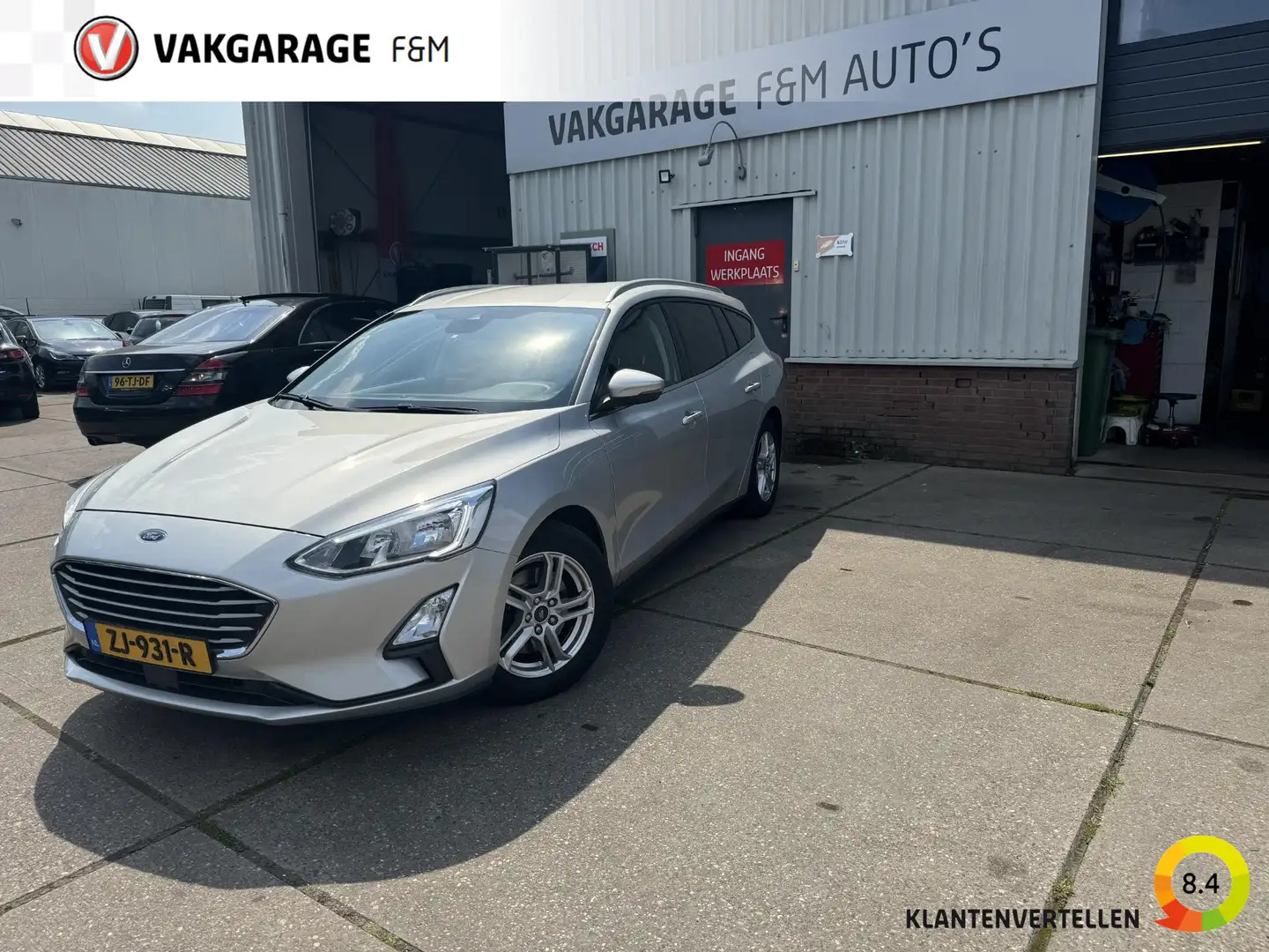 Ford Focus Wagon 1.0 EcoBoost Trend Edition Business Grey - 1