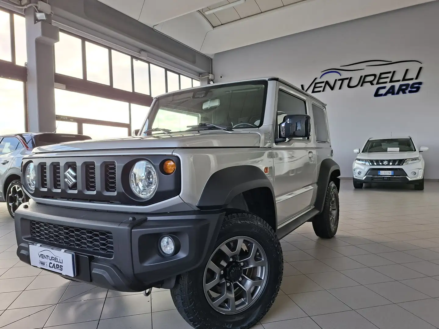 Suzuki Jimny Jimny IV 1.5 Top 4wd allgrip AUTOVETTURA 4POSTI Argento - 1