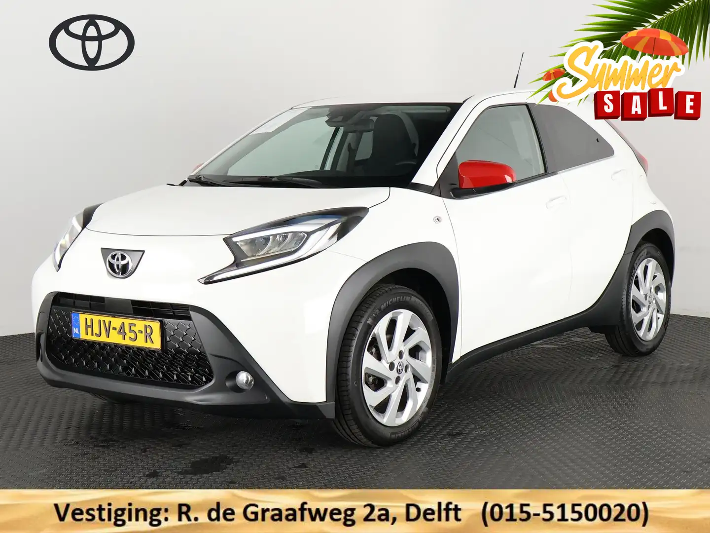 Toyota Aygo X 1.0 VVT-i MT First + Coral Red Pack | Apple Carpla Wit - 1