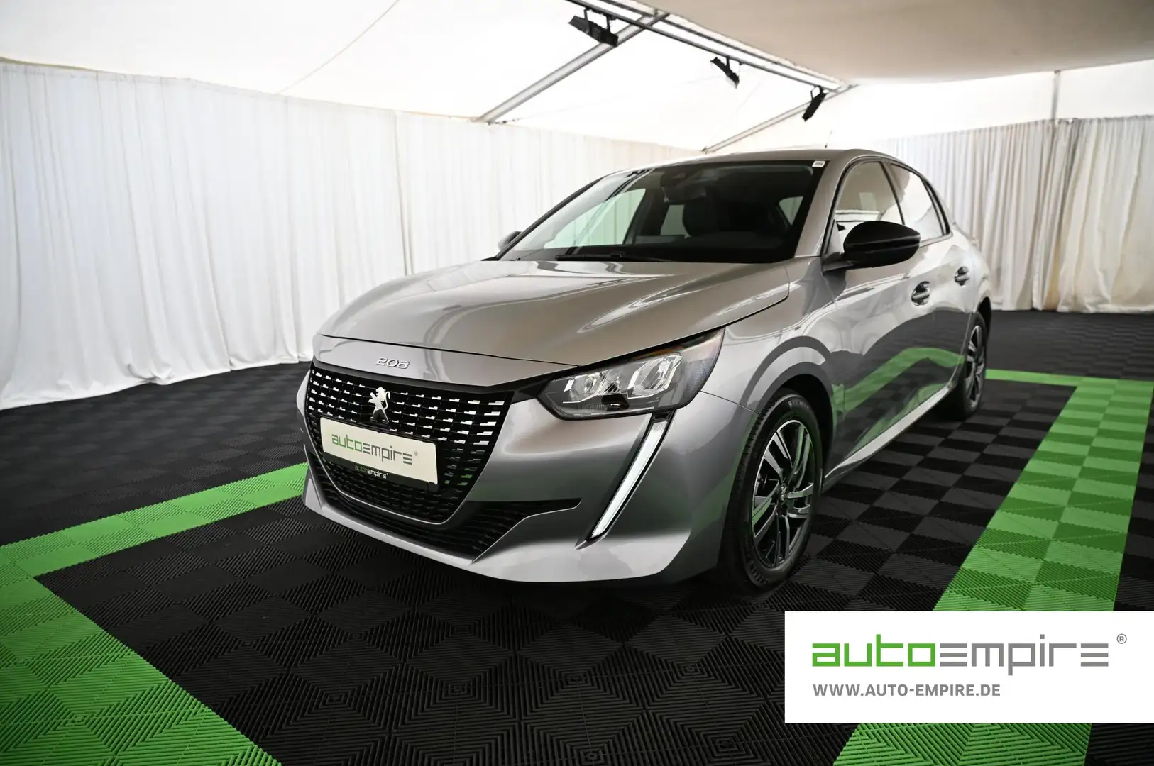 Peugeot 208 1.2 PT 100 Allure LED/NAVI/T-LEDER/CITY-P/16 Grijs - 1