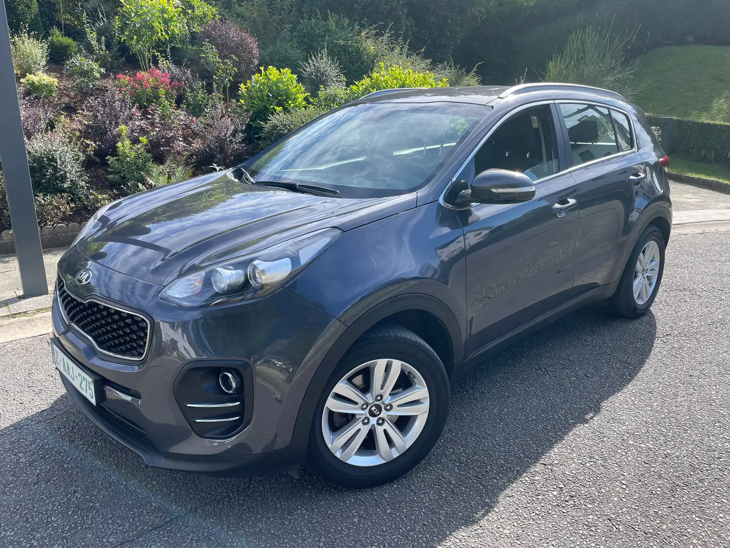 Kia Sportage 1.7 CRDi   GPS / REGUL VIT /CAMERA 1ER PROP CARNET Grijs - 1