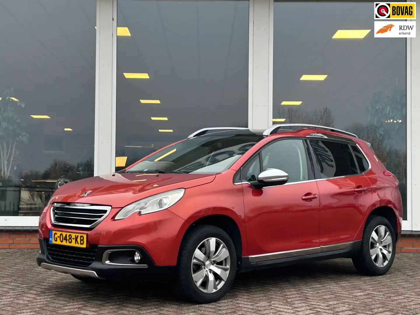 Peugeot 2008 1.6 VTi Allure - Navi - Clima - Panoramadak - LM Orange - 1
