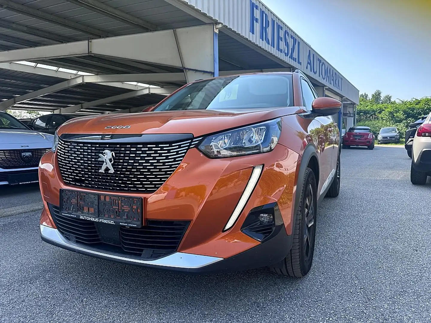 Peugeot 2008 BlueHDi 130 S&S Allure Pack EAT8 Orange - 1