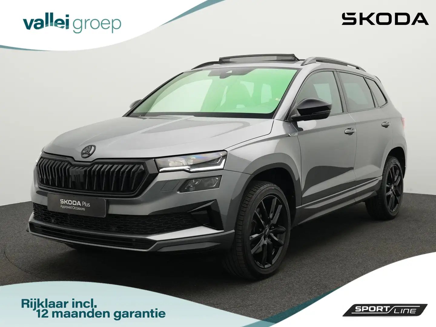 Skoda Karoq 1.5 TSI 150 pk DSG Sportline Business | Panoramada Gris - 1
