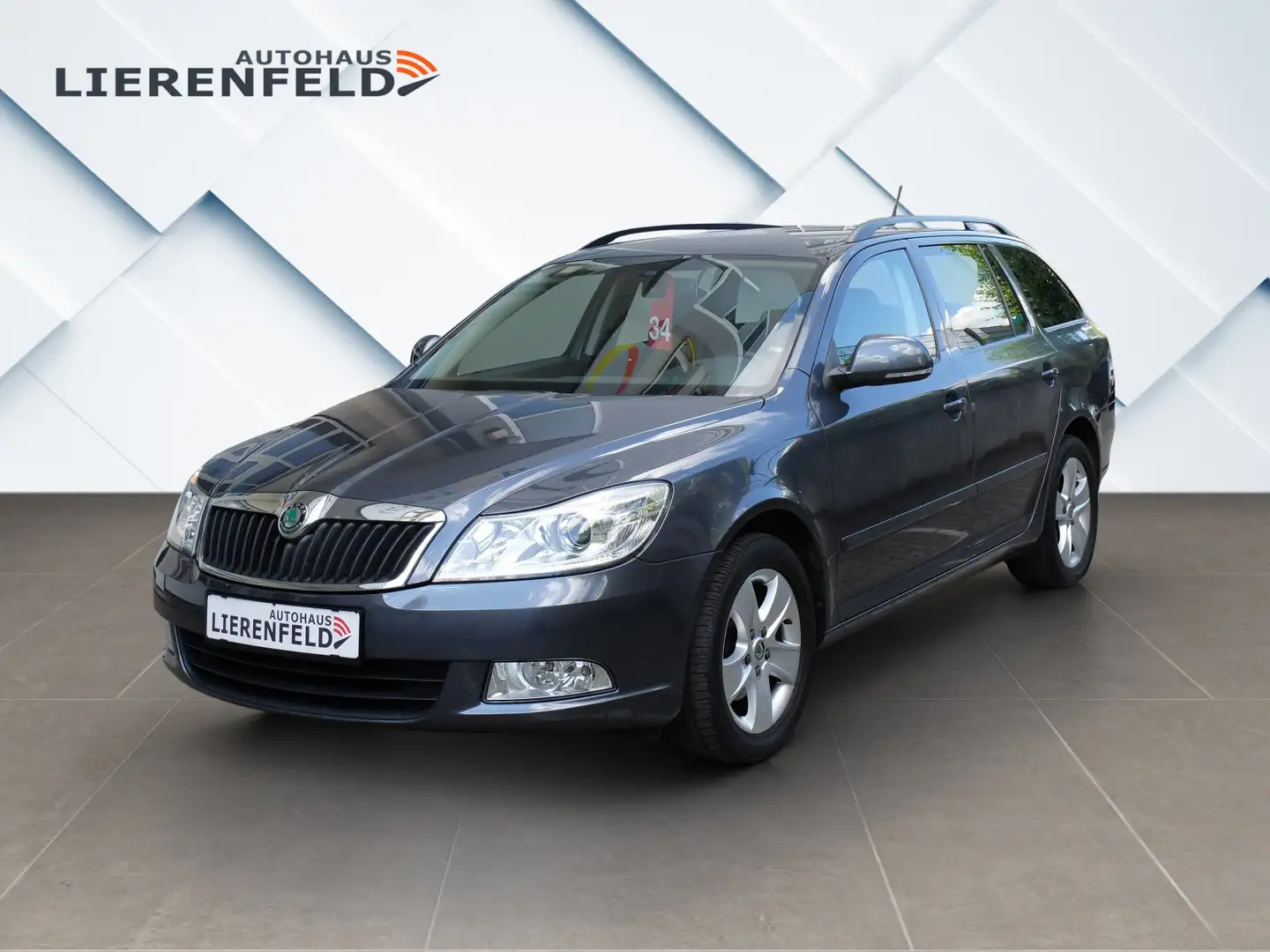 Skoda Octavia 1.6 TDI Automatik Leder Navi 1.Hand Grau - 1