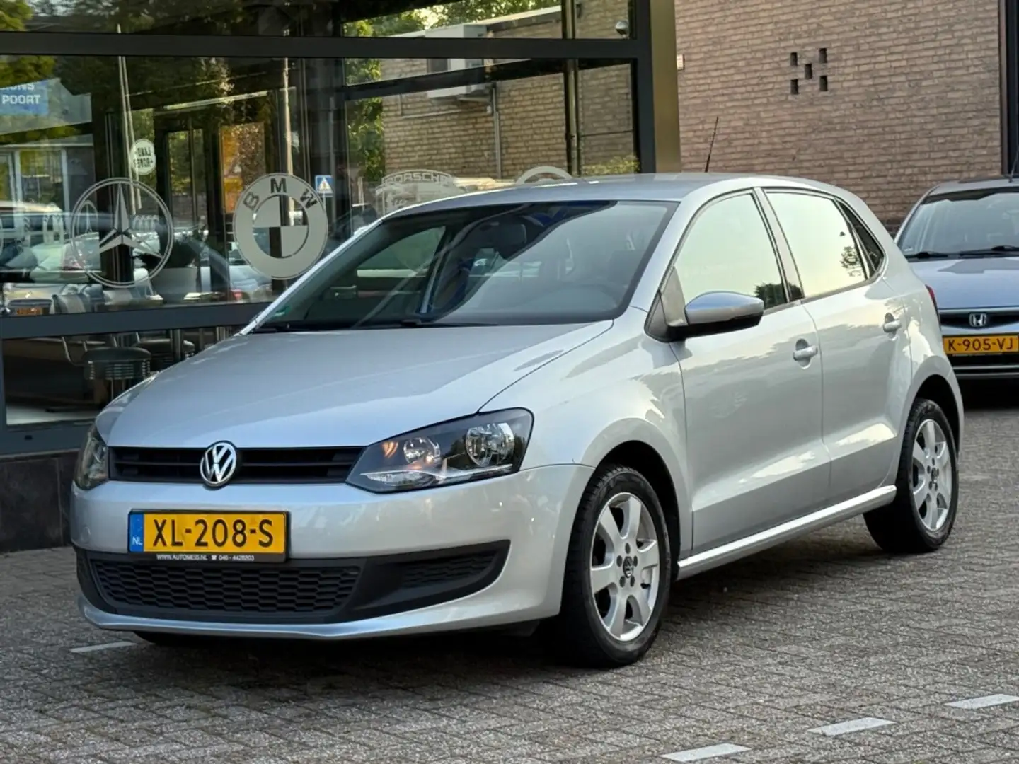 Volkswagen Polo 1.2-12V BlueMotion Comfortline Airco Navi Camera Grijs - 2