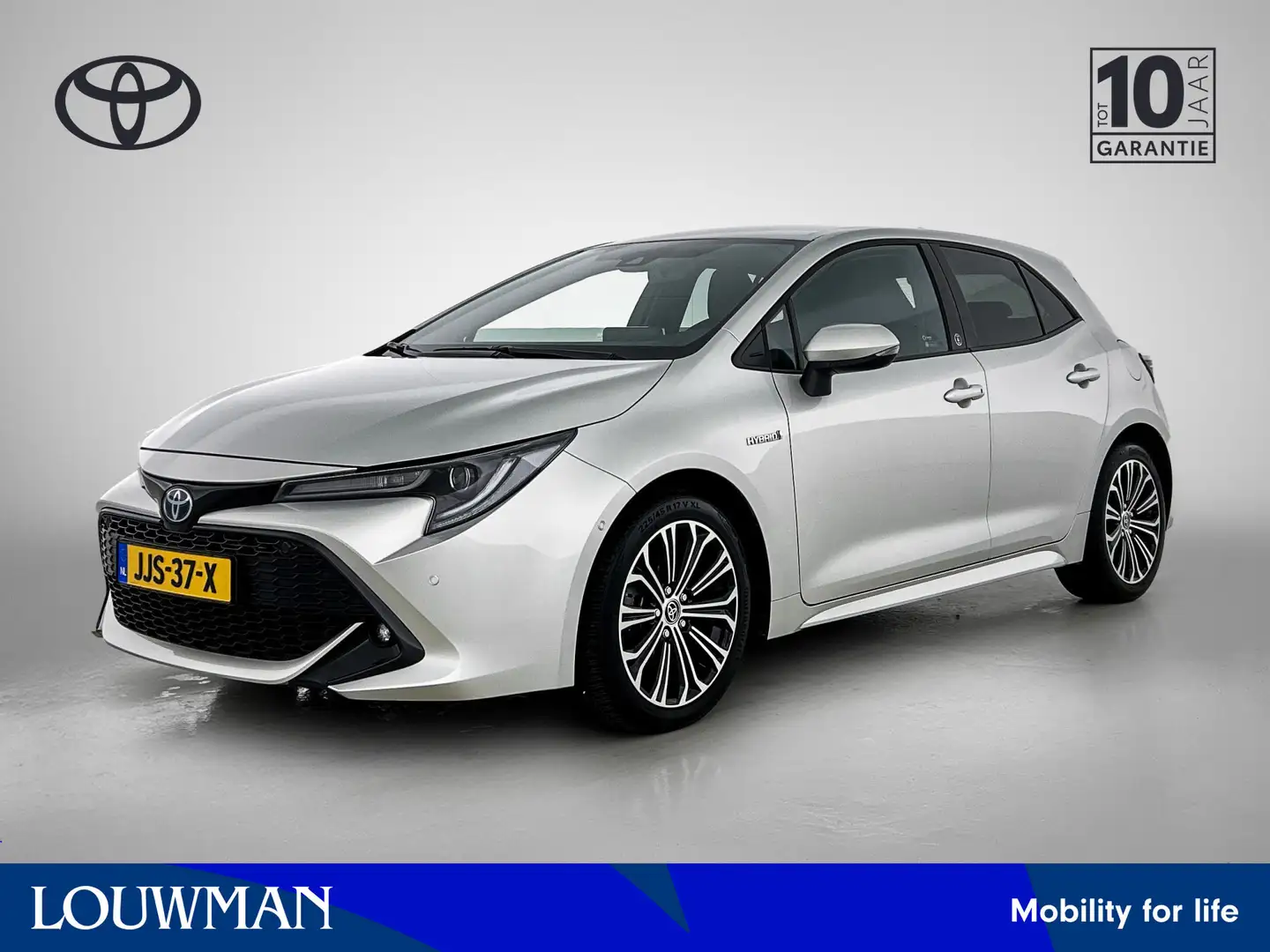 Toyota Corolla 1.8 Hybrid Dynamic Grijs - 1