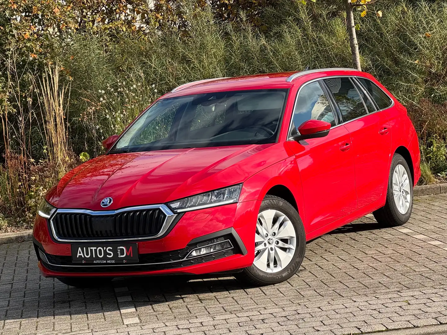 Skoda Octavia SW 1.0 TSI Ambition Navi,Cruise,Airco,PDC Rood - 1