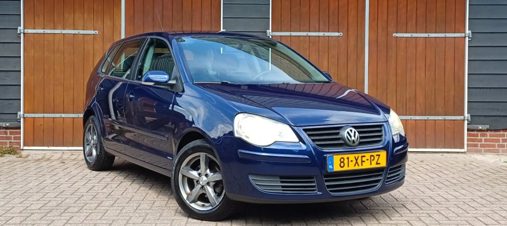 Volkswagen Polo 1.4-16V Optive, Airco, Trekhaak, Bluetooth, DAB+, Bleu - 1