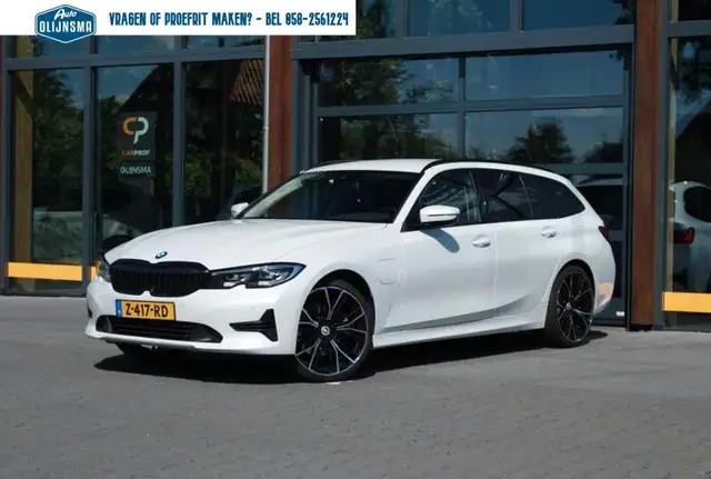 BMW 320 3-serie Touring 320e Business Edition Plus|PlugInH