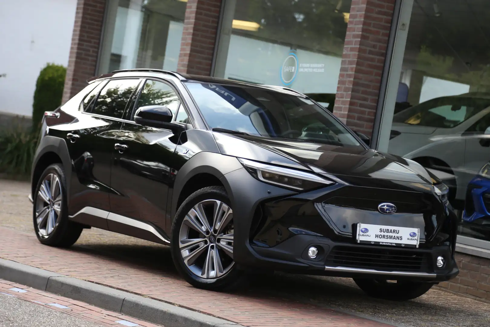 Subaru Solterra Sky Package 71 kWh AWD Panorama HK Leer 360view LE Zwart - 1