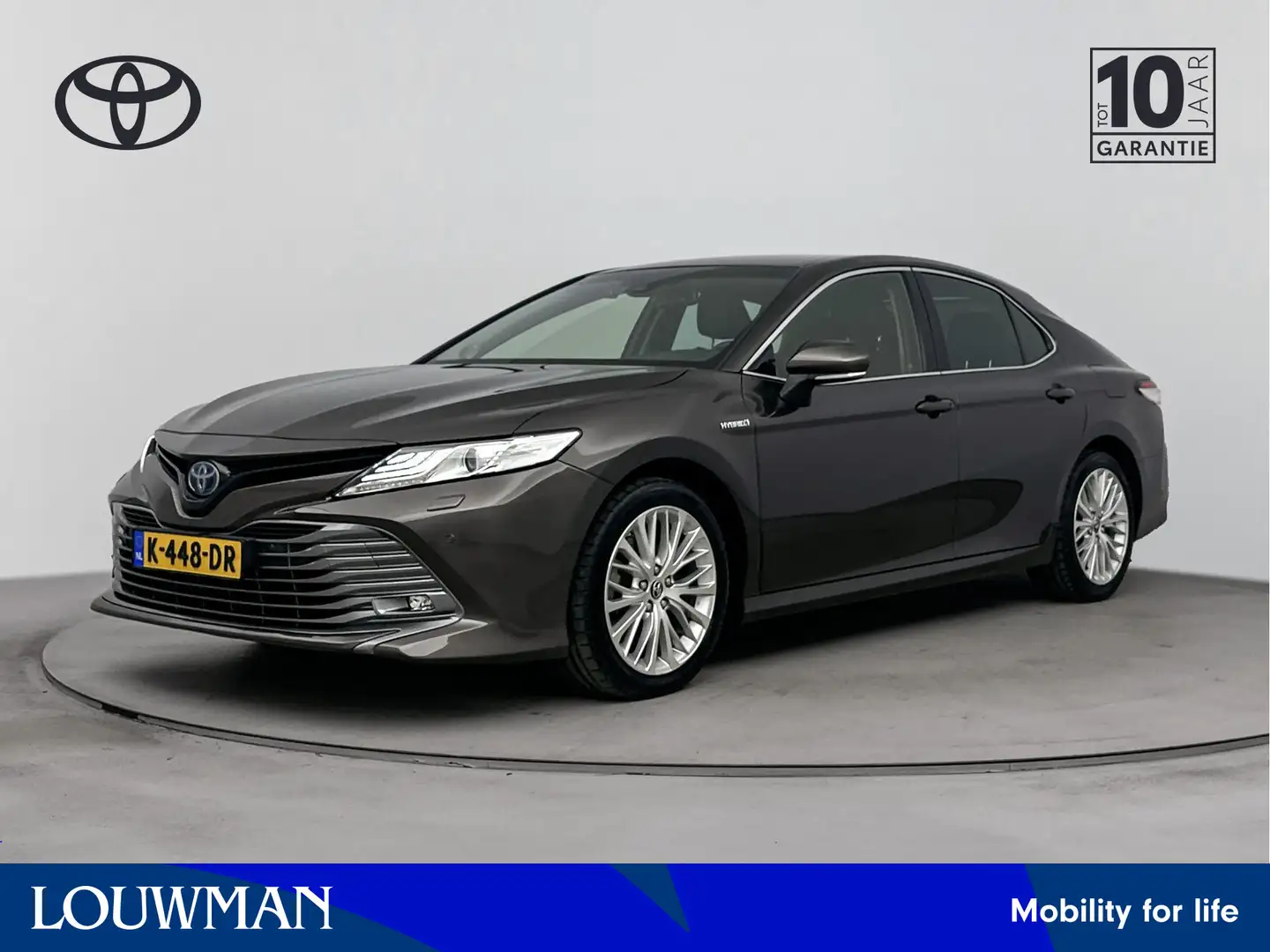 Toyota Camry 2.5 Hybrid Premium | Navigatie | Stoelverwarming | Bruin - 1