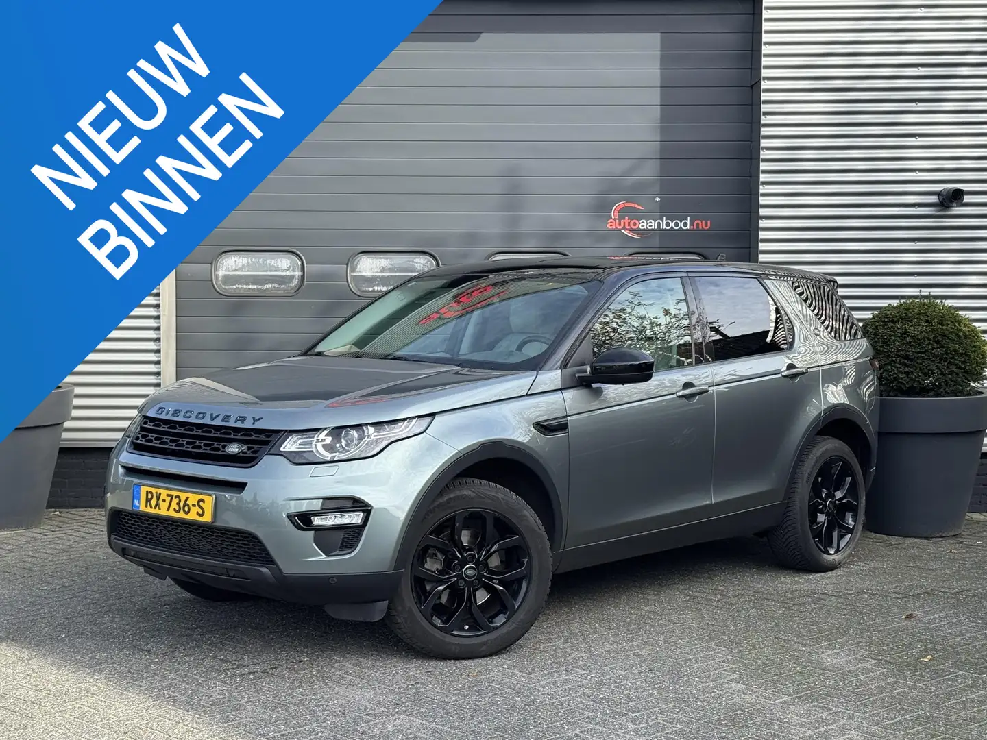 Land Rover Discovery Sport 2.0 Si4 4WD SE | Navigatie | Camera | Elektrische Grijs - 1