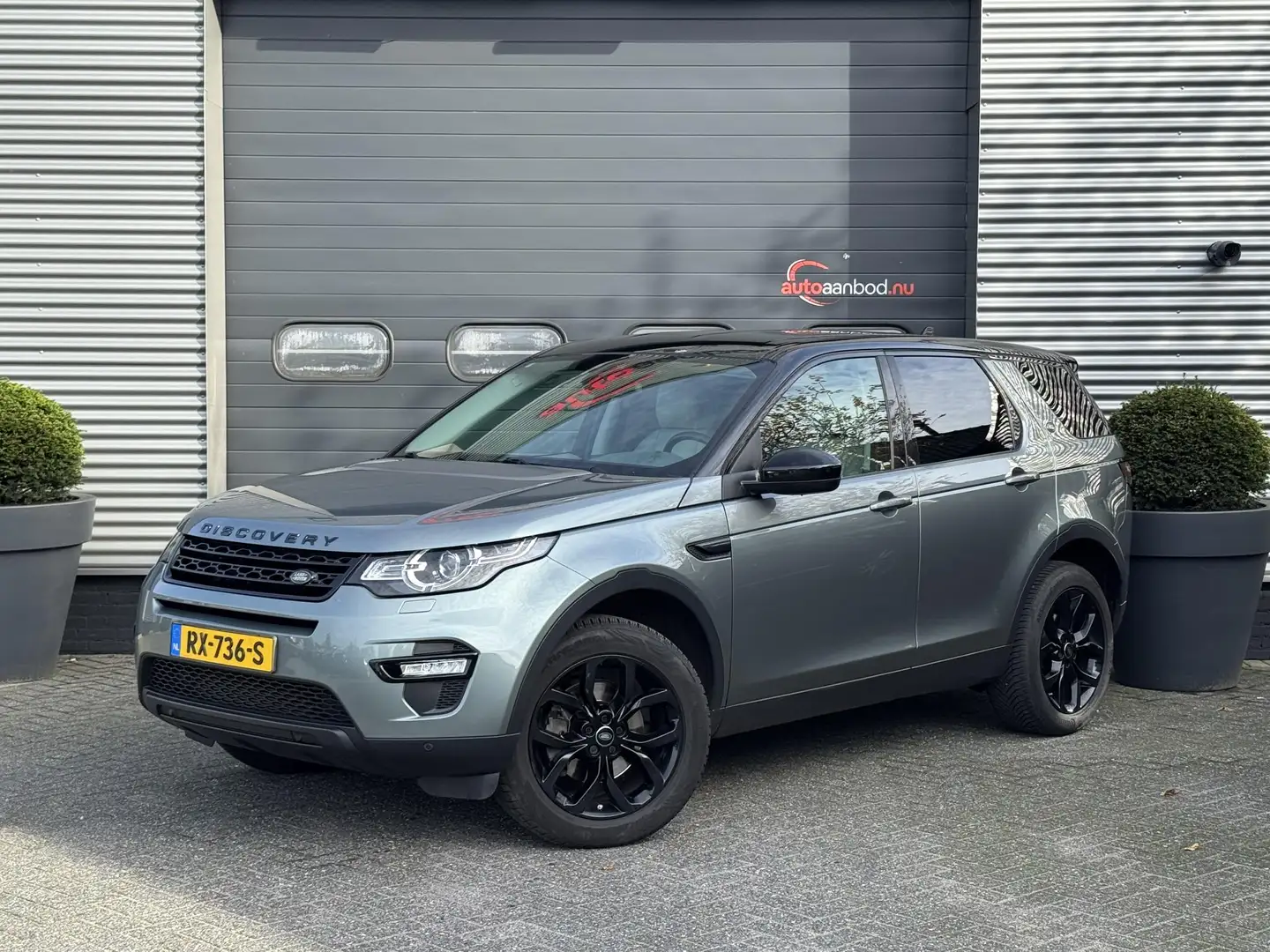 Land Rover Discovery Sport 2.0 Si4 4WD SE | Navigatie | Camera | Elektrische Gris - 1